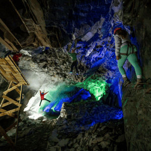 Children enjoying climbing inside the mine at Honister Slate Mine
